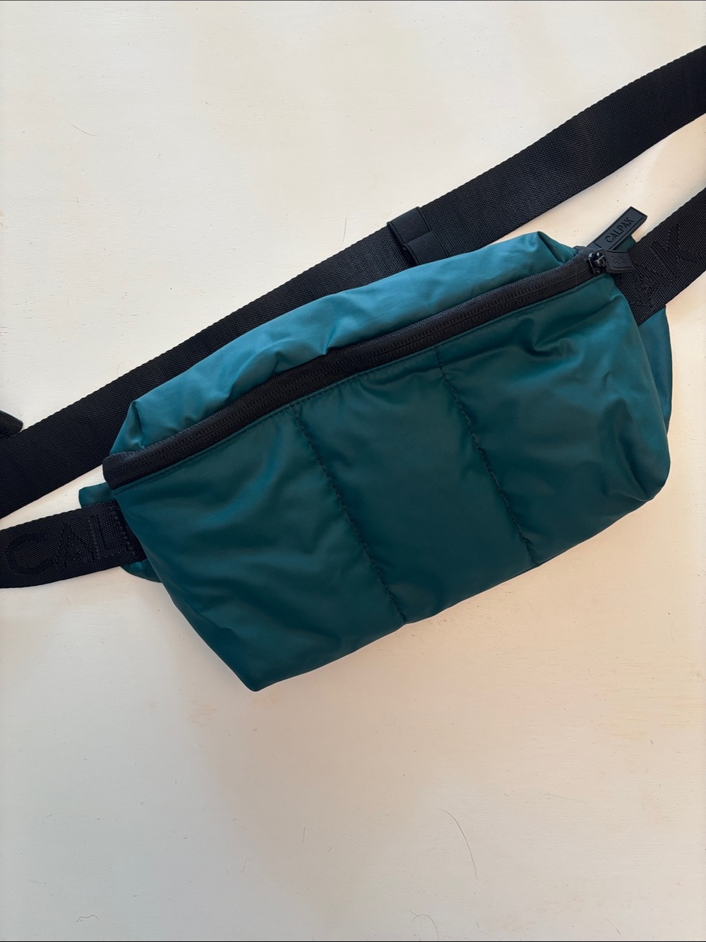 Calpak Teal Puffy Belt Bag with Black Strap